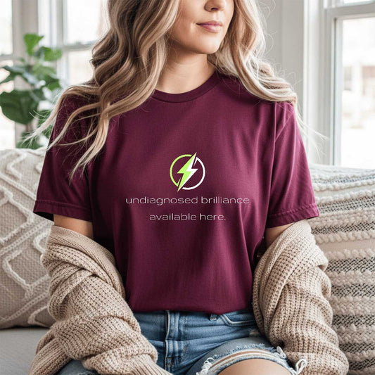 Undiagnosed Brilliance Available Here   Graphic T-Shirt